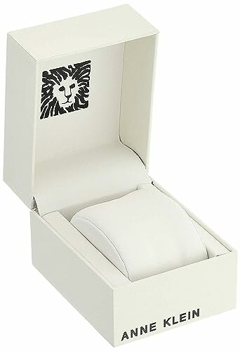 Open Anne Klein watch box with logo inside.