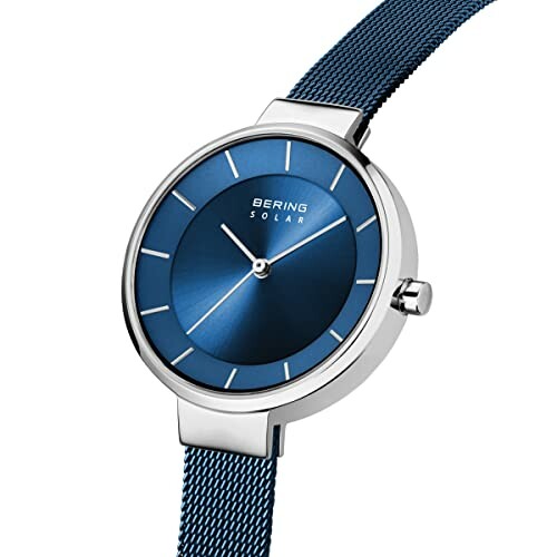 Elegant blue solar-powered watch with mesh strap