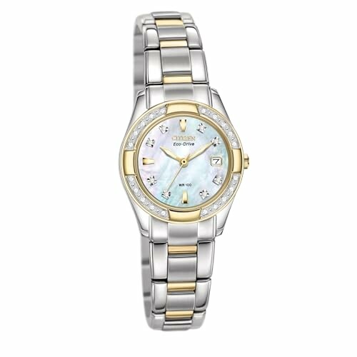 Elegant two-tone ladies wristwatch with diamond accents.