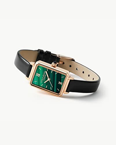 Rectangular luxury watch with green dial and black leather strap.