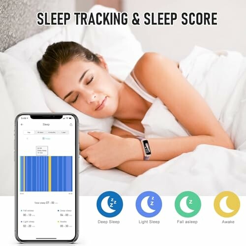 Woman sleeping with a sleep tracking device on wrist, phone showing sleep data.
